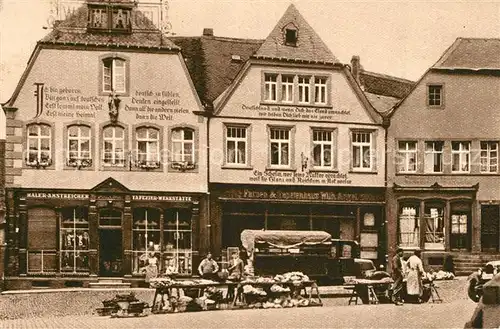 AK / Ansichtskarte St_Wendel Haeuser mit Bekenntnisspruechen am Domplatz St_Wendel