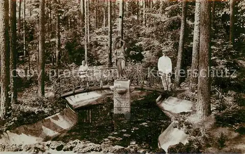 AK / Ansichtskarte Schlachtensee Waldpartie Park Statue Bruecke Schlachtensee