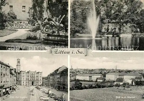 AK / Ansichtskarte Zittau Blumenuhr Welnaupark Platz der Jugend Rathaus Internat Zittau