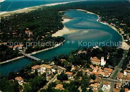 AK / Ansichtskarte Hossegor_Soorts_Landes Une partie de la Ville avec le Lac et lOcean Vue aerienne Hossegor_Soorts_Landes
