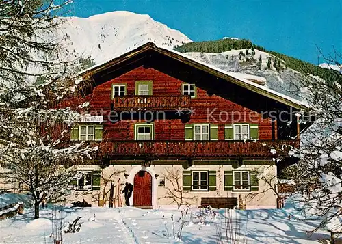AK / Ansichtskarte Rauris Pension Bergkristall im Winter Alpen Rauris