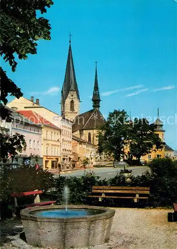 AK / Ansichtskarte Bad_Leonfelden Ortspartie mit Brunnen und Kirche Bad_Leonfelden