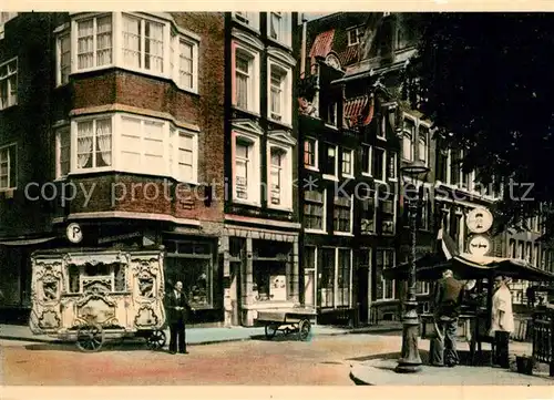 AK / Ansichtskarte Amsterdam_Niederlande Brug Heerengracht met draaiorgel en haringkraam Amsterdam_Niederlande