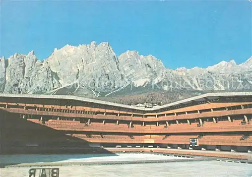 AK / Ansichtskarte Cortina_d_Ampezzo Belluno Stadio del ghiaccio Eisstadion Alpenpanorama Cortina_d_Ampezzo