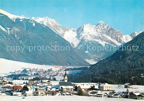 AK / Ansichtskarte Oberolang_Pustertal Gesamtansicht mit Alpenpanorama im Winter oberolang_Pustertal