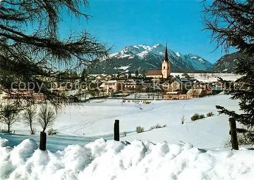 AK / Ansichtskarte Mariapfarr Ortsansicht mit Kirche Winterlandschaft Alpen Mariapfarr