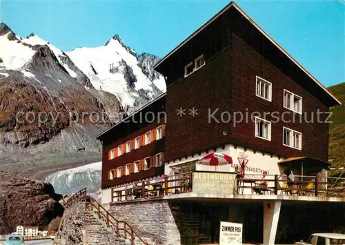 AK / Ansichtskarte Heiligenblut_Kaernten Grossglockner Hochalpenstrasse Karl Volkert Haus gegen Pasterze und Grossglockner Hohe Tauern Heiligenblut Kaernten