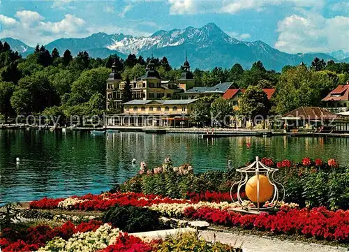 AK / Ansichtskarte Velden_Woerthersee Hotel Schloss Velden gegen Mittagskogel Karawanken Velden Woerthersee