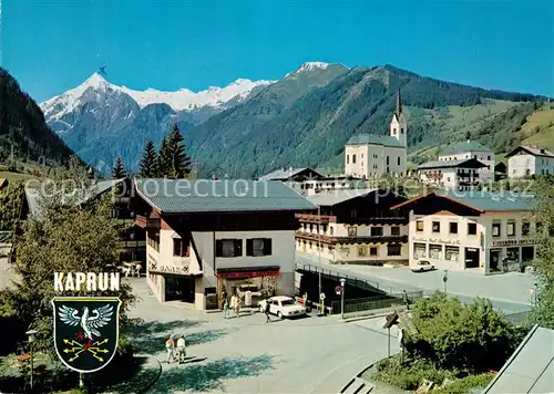 AK / Ansichtskarte Kaprun Ortsansicht mit Kirche Blick zum Kitzsteinhorn und Maisskogel Hohe Tauern Kaprun