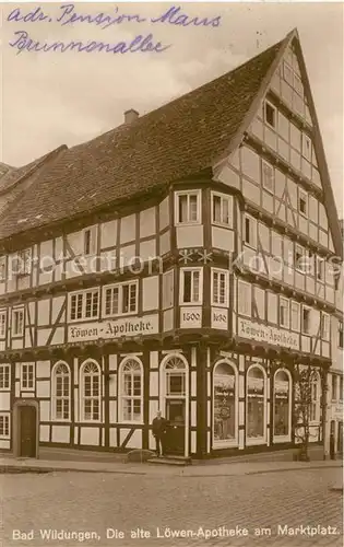 AK / Ansichtskarte Bad_Wildungen Alte Loewenapotheke am Marktplatz Fachwerkhaus Bad_Wildungen