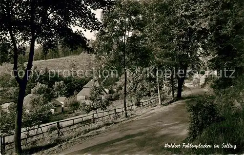 AK / Ansichtskarte Fohlenplacken Landstrasse durch den Wald zum Ort Fohlenplacken