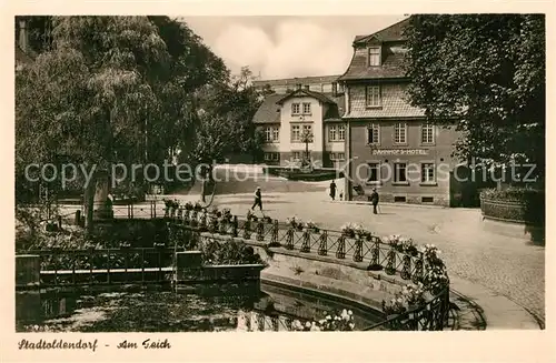 AK / Ansichtskarte Stadtoldendorf Partie am Teich Bahnhofshotel Stadtoldendorf