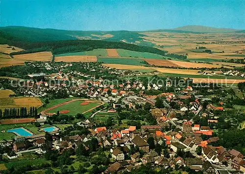 AK / Ansichtskarte Eschershausen_Holzminden Wilhelm Raabe Stadt Fliegeraufnahme Eschershausen Holzminden