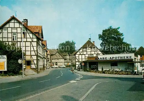 AK / Ansichtskarte Eschershausen_Holzminden Raabe Strasse Fachwerkhaeuser Apotheke Eschershausen Holzminden