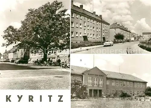 AK / Ansichtskarte Kyritz_Brandenburg Platz des Friedens Friedensstrasse Wilhelm Pieck Schule Kyritz Brandenburg