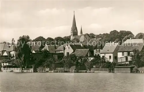 AK / Ansichtskarte Malchow Teilansicht mit Kirche Blick ueber den See Mecklenburgische Seenplatte Malchow