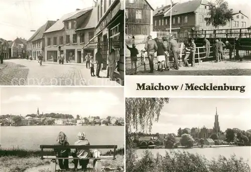 AK / Ansichtskarte Malchow Lange Strasse Drehbruecke Blick ueber den See Kloster Kirche Malchow