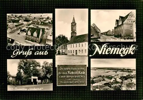 AK / Ansichtskarte Niemegk Markt Rathaus HO Gaststaette Lindenhof Kirche Grossstrasse Rathaus Panorama Niemegk