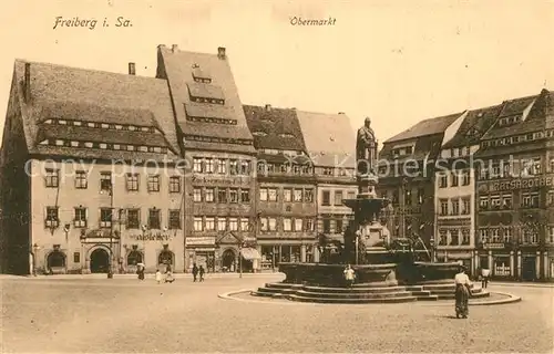 AK / Ansichtskarte Freiberg_Sachsen Obermarkt Brunnen Feldpost Freiberg Sachsen