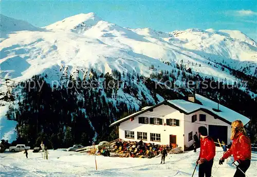 AK / Ansichtskarte Reschen_See_Tirol Schihaus Schoeneben Wintersportplatz Alpen 