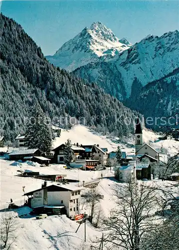 Gaschurn_Vorarlberg Ortsansicht mit Kirche Blick zur Vallula Winterpanorama Alpen Gaschurn Vorarlberg