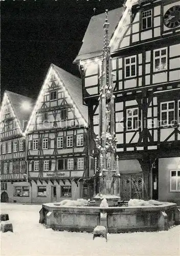 Bad_Urach Marktplatz Brunnen Altstadt Fachwerkhaeuser im Winter Bad_Urach