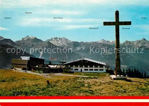 Schruns_Vorarlberg Hochjochbahn Bergstation mit Restaurant Gipfelkreuz Panorama Rhaetikon Schruns Vorarlberg