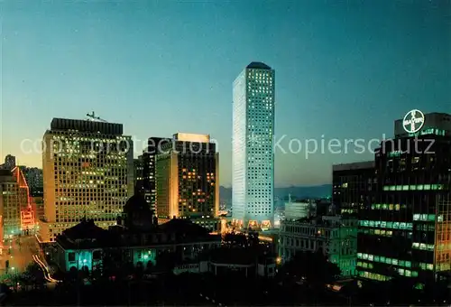 AK / Ansichtskarte Hongkong Hafen Hotel Buerohaeuser Nacht Hongkong