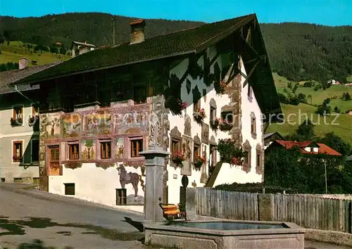AK / Ansichtskarte Wenns_Pitztal_Tirol Platzhaus Fassadenmalerei Brunnen Wenns_Pitztal_Tirol