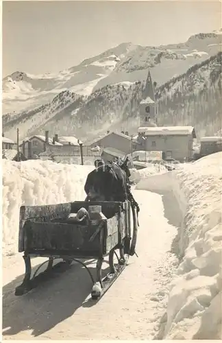 Val_d_Isere Pferdeschlitten Ortsansicht mit Kirche Franzoesische Alpen Val_d_Isere