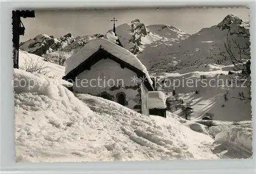 AK / Ansichtskarte La_Clusaz Chapelle du Fernuy Chaine des Aravis Alpes en hiver La_Clusaz