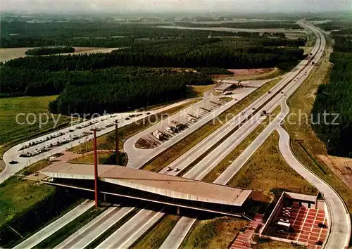 AK / Ansichtskarte Autobahn Bundesautobahn Br?ckenrasthaus Dammer Berge Fliegeraufnahme Holdorf  