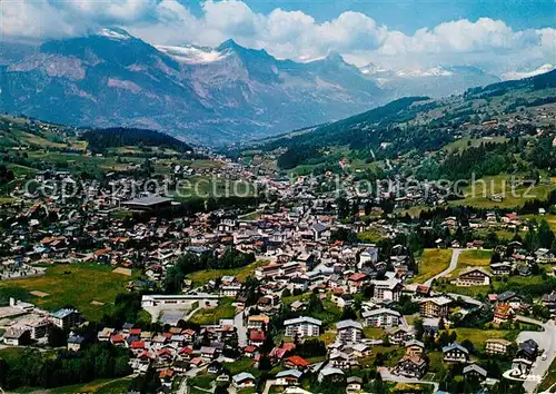 AK / Ansichtskarte Megeve Vue generale aerienne et la chaine des Fiz Megeve