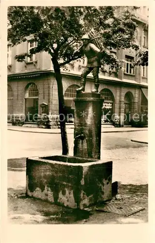 AK / Ansichtskarte Aschersleben Holzmaennchenbrunnen Aschersleben