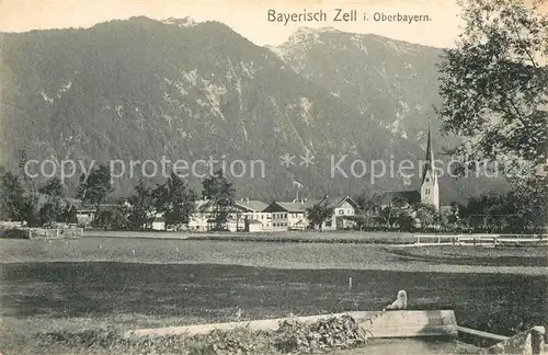 AK / Ansichtskarte Bayrischzell Ortsansicht mit Kirche Oberbayerische Alpen Bayrischzell