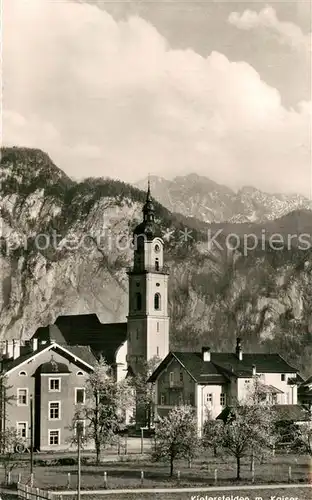 AK / Ansichtskarte Kiefersfelden Ortsmotiv mit Kirche Blick zum Wilden Kaiser Kaisergebirge Kiefersfelden