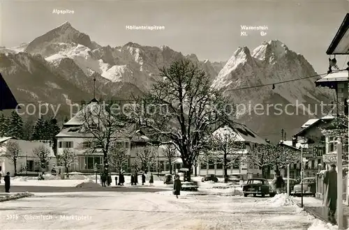 AK / Ansichtskarte Garmisch Partenkirchen Marktplatz Alpenblick im Winter Garmisch Partenkirchen