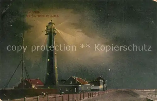 AK / Ansichtskarte Scheveningen De Vuurtoren bij avond Leuchtturm Nachtaufnahme Scheveningen
