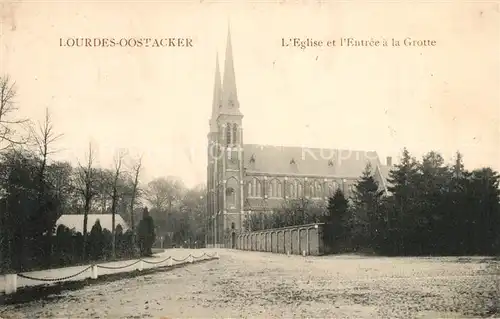 AK / Ansichtskarte Lourdes_Oostakker Eglise et lEntree a la Grotte Lourdes_Oostakker