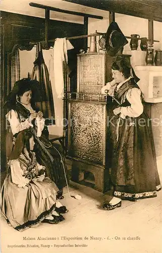 AK / Ansichtskarte Nancy_Lothringen Maison Alsacienne a lExposition de Nancy On se chauffe Nancy Lothringen