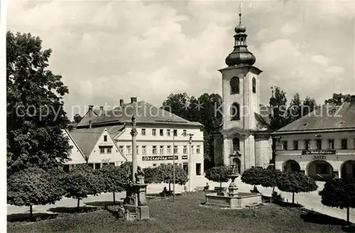 AK / Ansichtskarte Rokytnice_v_Orlickych_horach Platz Denkmal Brunnen Gasthaus Kirche Rokytnice_v