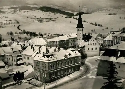 AK / Ansichtskarte Stare_Mesto_pod_Sneznikem Ortsansicht mit Kirche Winterpanorama 