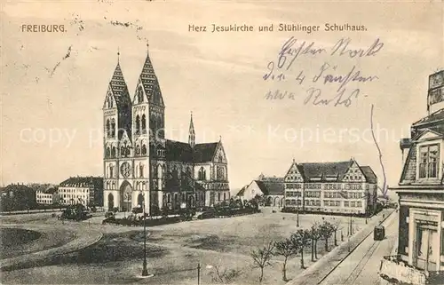 AK / Ansichtskarte Freiburg_Breisgau Herz Jesu Kirche und Stuehlinger Schulhaus Freiburg Breisgau
