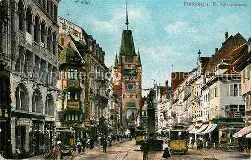 AK / Ansichtskarte Freiburg_Breisgau Kaiserstrasse Brunnen Strassenbahn Martinstor Freiburg Breisgau