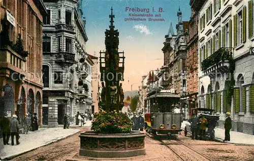 AK / Ansichtskarte Freiburg_Breisgau Kaiserstrasse Gothischer Brunnen Strassenbahn Freiburg Breisgau