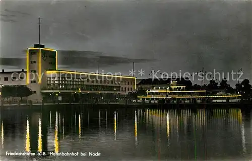 AK / Ansichtskarte Friedrichshafen_Bodensee Hafenbahnhof bei Nacht Friedrichshafen Bodensee