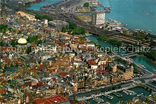 AK / Ansichtskarte Amsterdam_Niederlande Fliegeraufnahme Lutherische Kirche Hafengebaeude Amsterdam_Niederlande