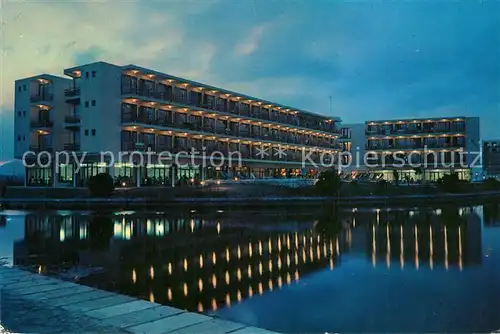 AK / Ansichtskarte Puerto_Alcudia_Mallorca Hotel Boccaccio am Abend Wasserspiegelung Puerto_Alcudia_Mallorca