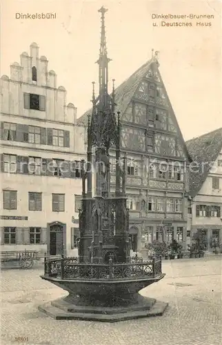 AK / Ansichtskarte Dinkelsbuehl Dinkelbauer Brunnen und Deutsches Haus Dinkelsbuehl