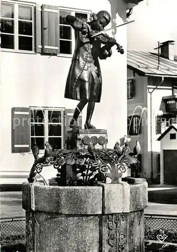 AK / Ansichtskarte Mozart_Wolfgang_Amadeus Mozartbrunnen St. Gilgen Wolfgangsee Salzkammergut  